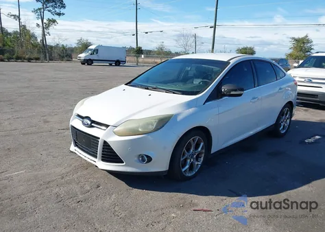 2013 Ford Focus Titanium из США, поврежденный, VIN 1FADP3J2XDL207150